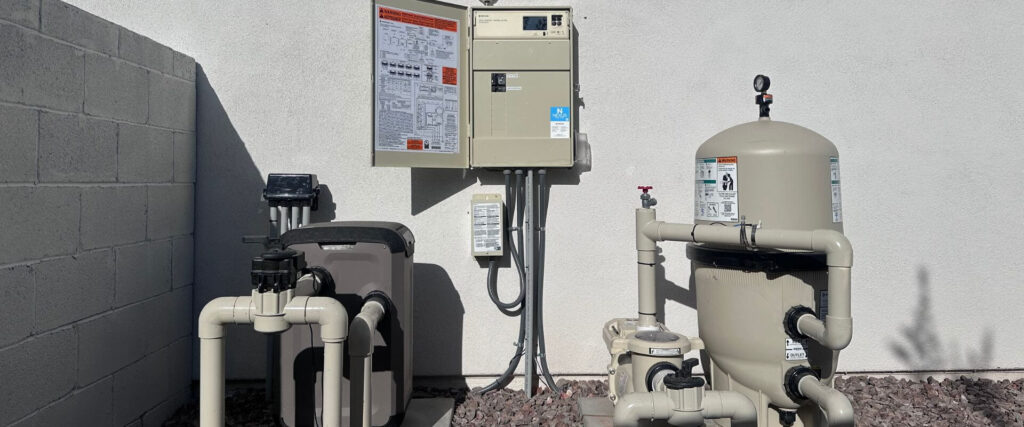 Pool electrician insurance Arizona — equipment pad with sub-panel and conduit